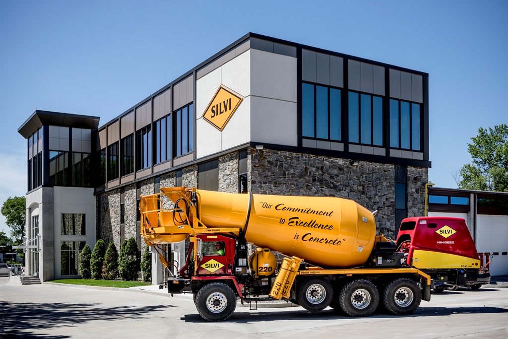 A ready-mix concrete truck parked in front of the Morrisville office.