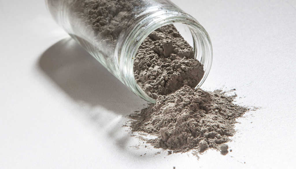 Fly Ash added to concrete as a partial replacement for Portland Cement
