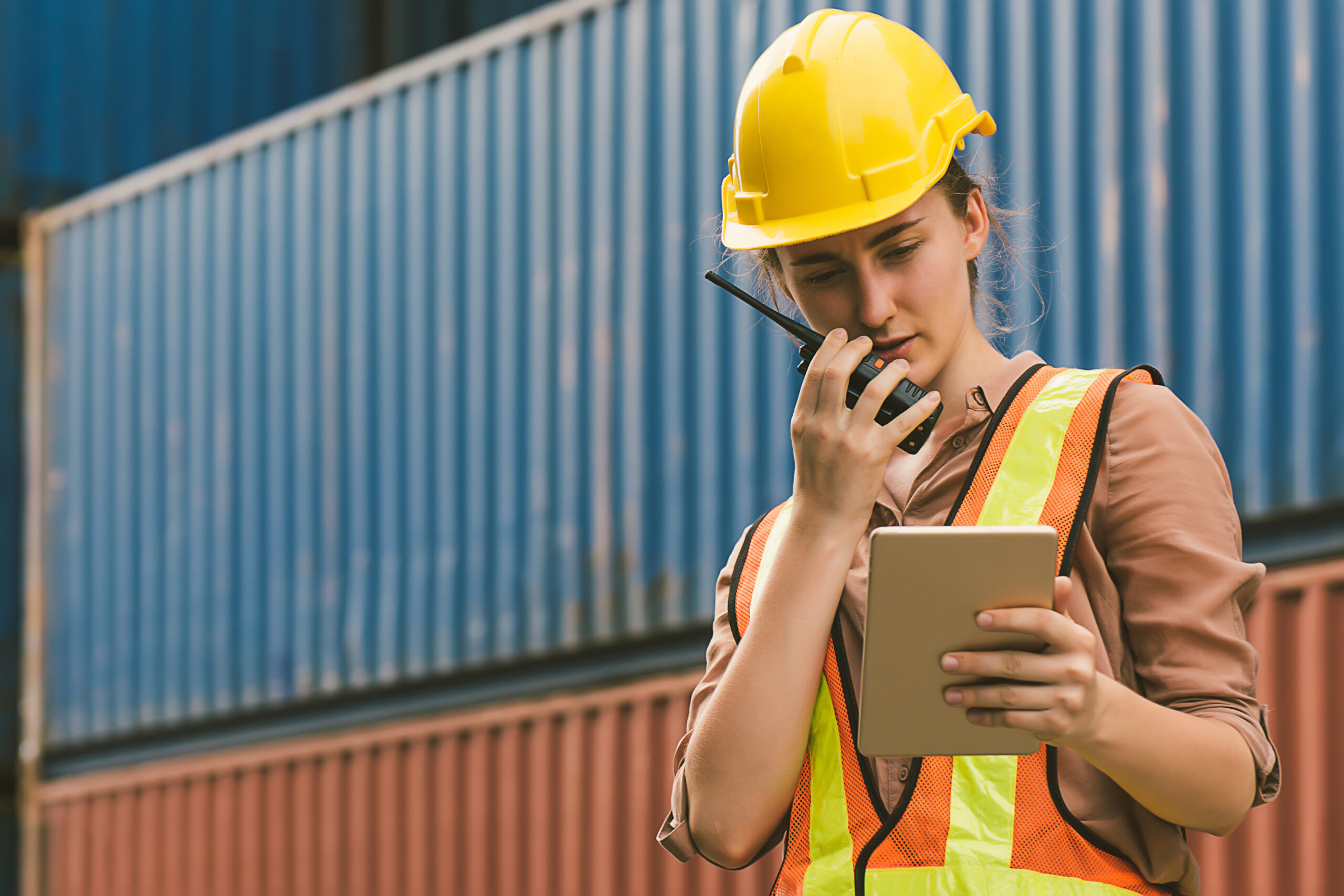 construction worker lamenting over supply chain issues