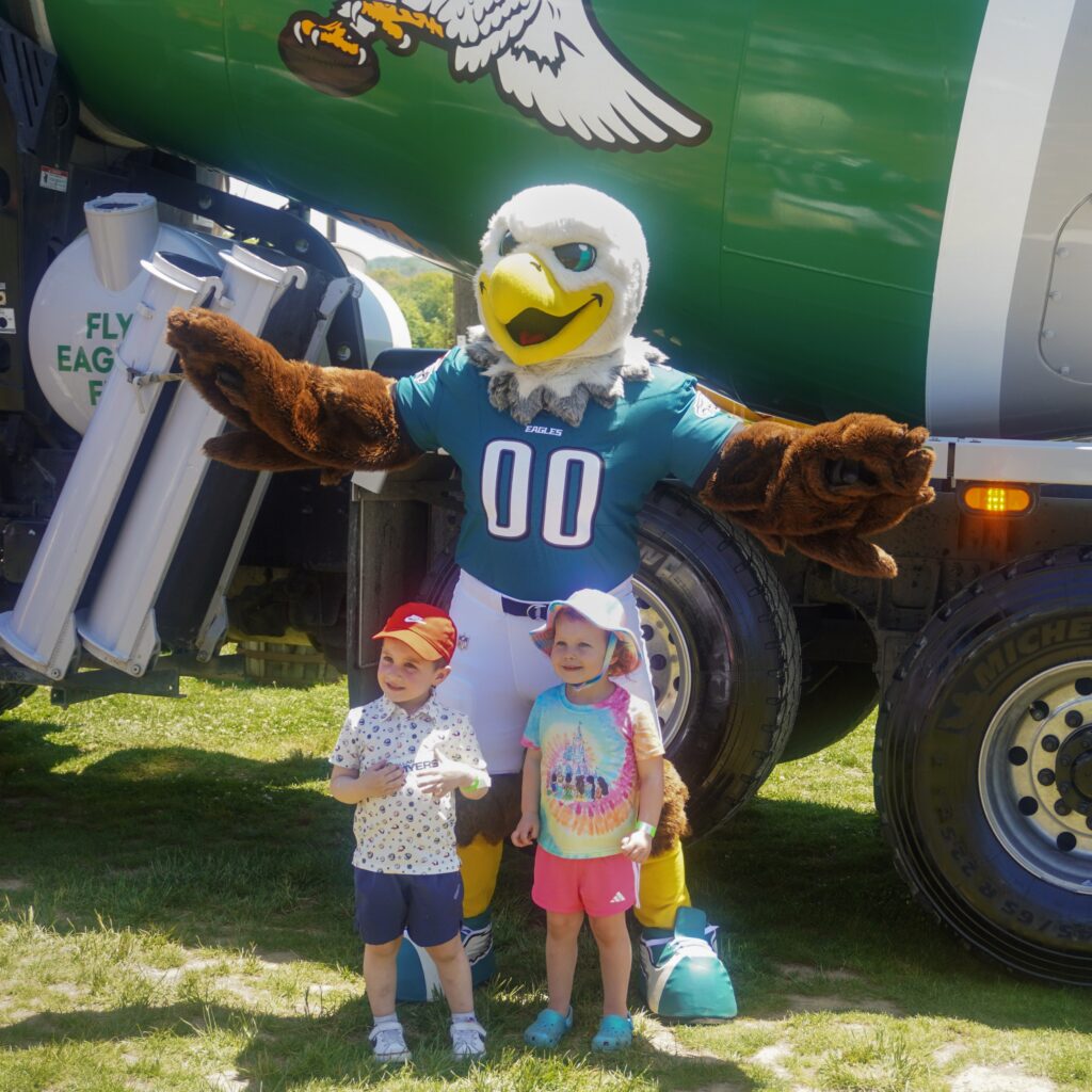 Philadelphia Eagles' mascot Swoop poses for a picture with attendees at the Silvi Foundation Touch-a-Truck.